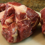 raw cut of meat with high amounts of visible fat